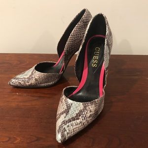 Guess pointed toe D’Orsay snake print stilettos.